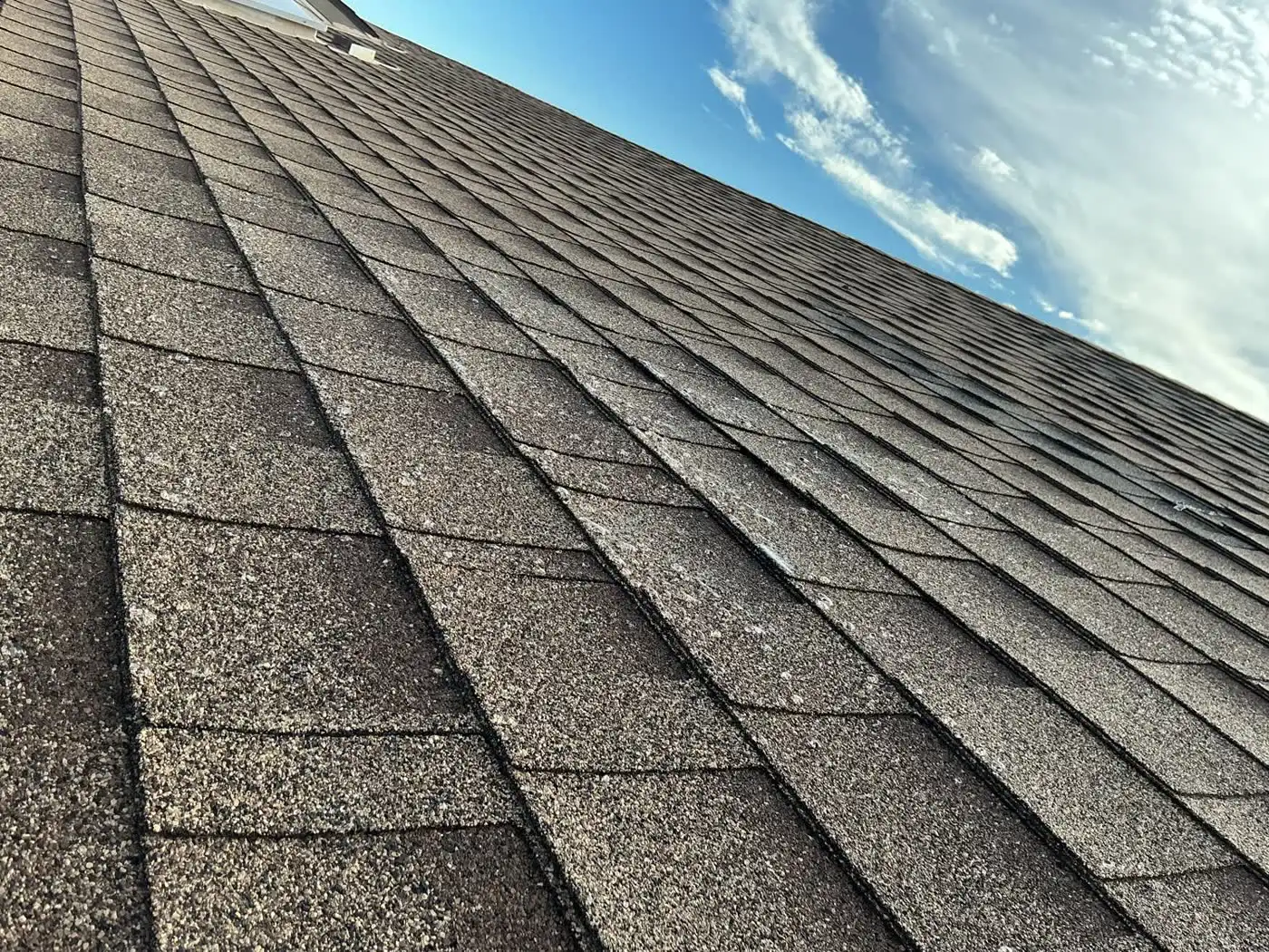 Arizona asphalt shingle roof under full sun after NexaNano UV treatment