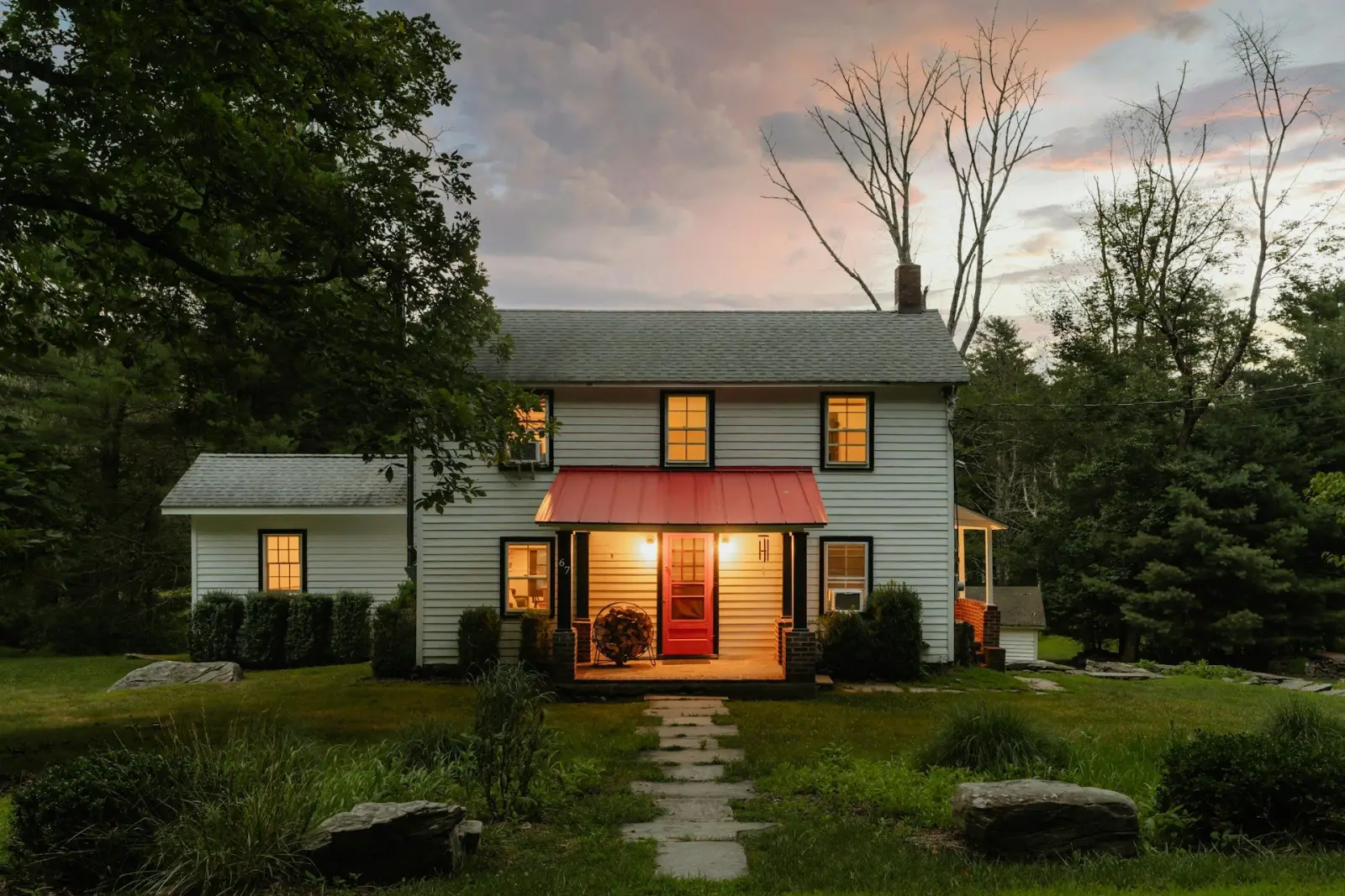 Arizona home at sunset with the low light hitting a shingled roof