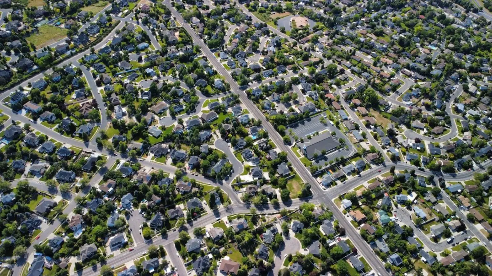 Arizona HOA neighborhood with matching tile and shingle roofs from above