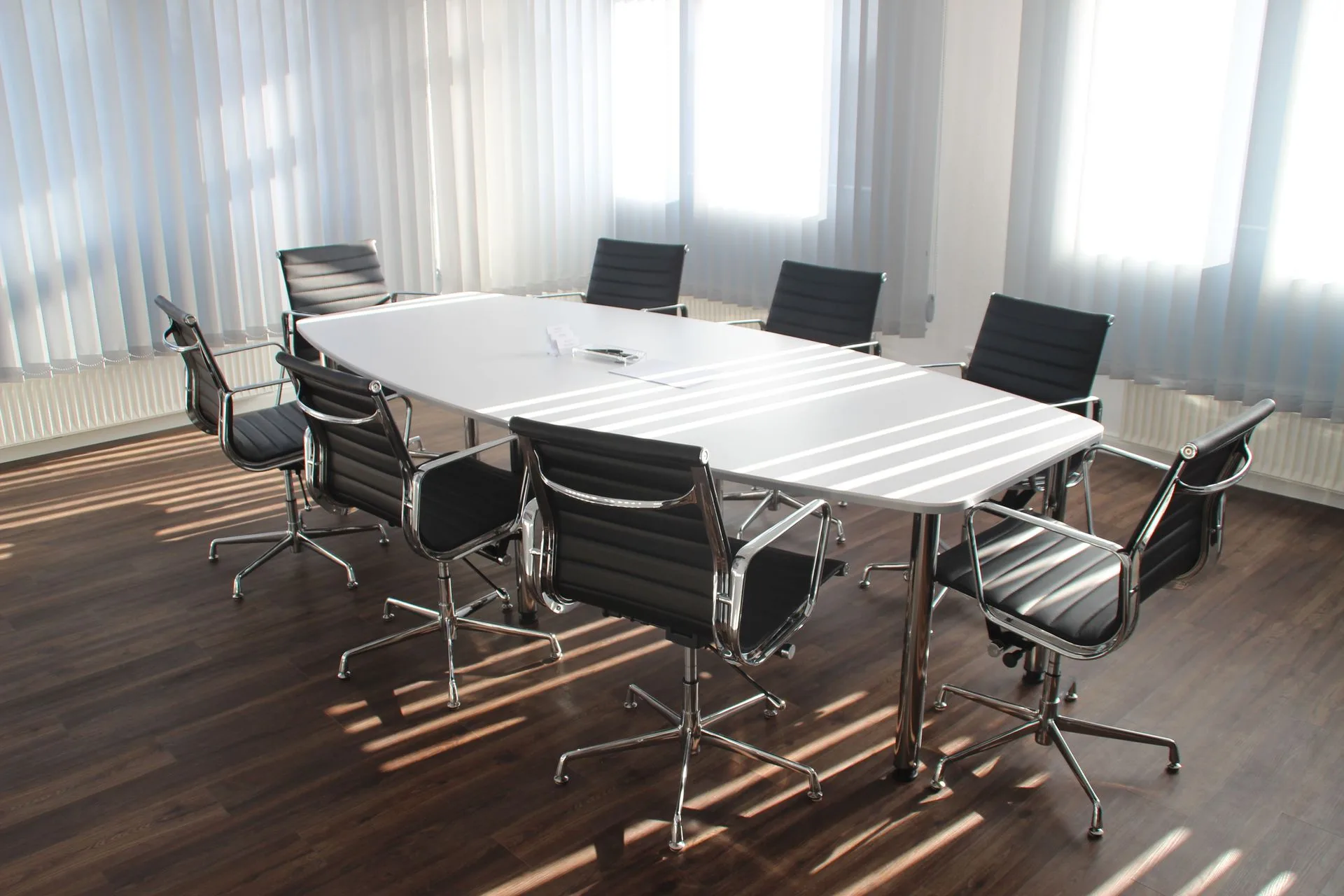 HOA board meeting room table with community plans