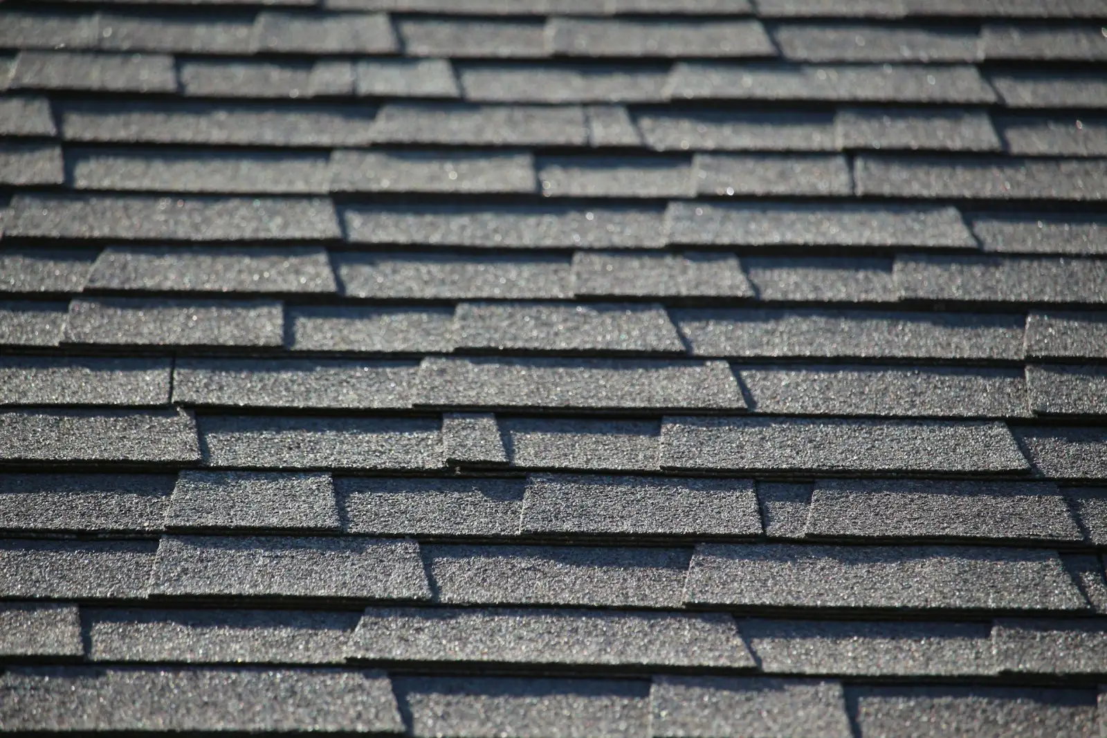 Arizona shingled roof close-up under a clear blue sky